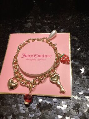 Juicy Couture Gold Charm Bracelet with Red Strawberry and Crystal Drop